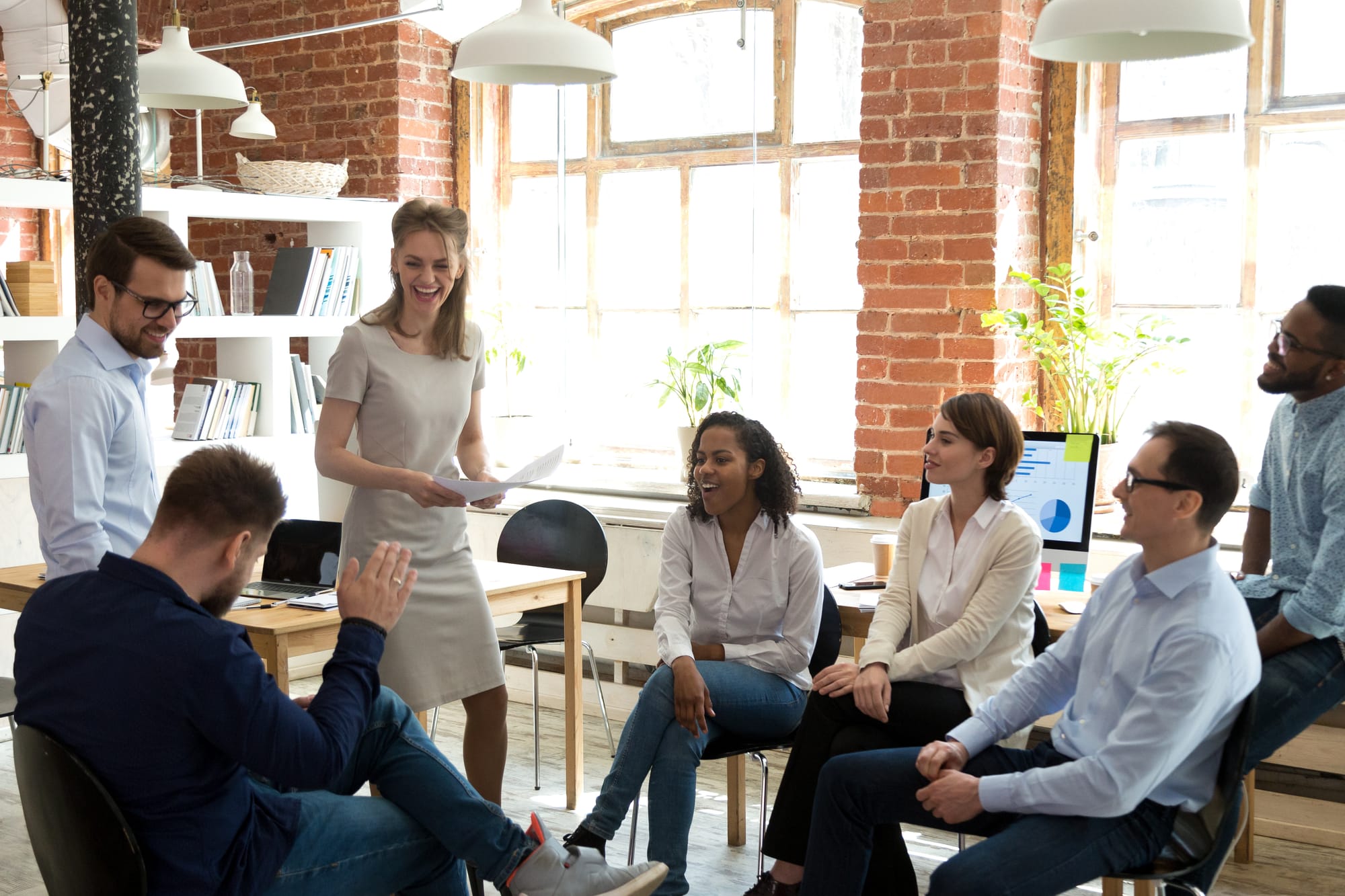 Team meeting around a table in discussion